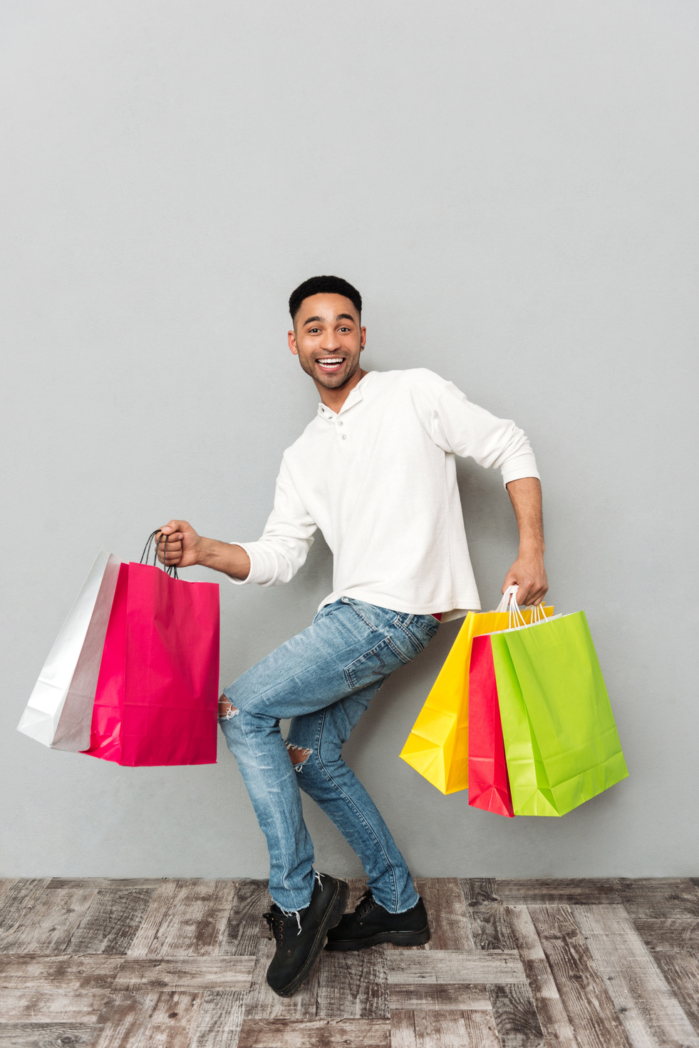 Man Holding Shopping Bags